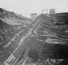 A dragline, installed after July 1937, brought oil sands to the separation plant.<br/>Source:	University of Alberta Archives, 83-160-0