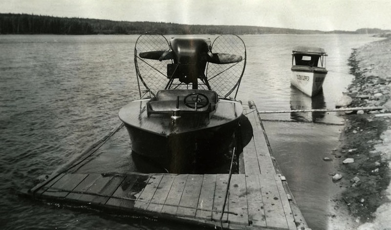 Robert Fitzsimmons's push-prop boat and the <em>Golden Slipper</em> are moored at Bitumount, n.d.