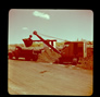 An excavator and dump truck in the Alberta Government Oil Sands Project quarry, n.d.<br/>Source: University of Alberta Archives, 91-137-023