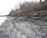 Remains of log cribbing reinforcing the bank of the Athabasca River, 1999<br/>Source: Historic Resources Management, 99110910