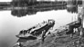 A barge loaded with oil drums at the International Bitumen Company landing, ca. 1936<br/>Source: Provincial Archives of Alberta, A3391