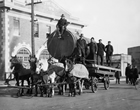 A large oil drum being transported by horse and wagon, Edmonton, 1920