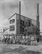 Staff pose outside the new sulfur plant, 1952. <br />Source: Provincial Archives of Alberta, P2991
