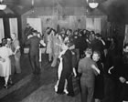 Couples dancing in Turner Valley, 1942; dances were a popular form of respectable leisure in the Turner Valley area. <br />Source: Glenbow Archives, IP-14a-814