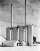 The hydrogen sulfide actifiers at the Madison Natural Gas scrubbing plant, located adjacent to the main Turner Valley plant, 1945; Madison Natural Gas was created by Royalite in 1945 to manage the removal of hydrogen sulfide from the natural gas as well as the distribution of the gas through the pipeline network. <br />Source: Glenbow Archives, IP-6d-4-9a