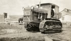 The Royalite plant tractor, Turner Valley Alberta, possibly during the Royalite Plant construction, ca. 1920s; vehicles  with caterpillar tracks were better suited for some of the road and site conditions throughout the Turner Valley region. <br />Source: Glenbow Archives, PA-3501-78