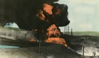 A colourized view of natural gas flaring at Hell’s Half Acre, ca. 1920-1939. <br />Source: Glenbow Archives, PB-53-1