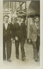 Joe Sikora (in centre) walking in Calgary, n.d.