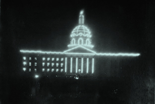 Alberta Legislature Building decorated with lights, 1912