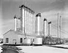 The scrubbing plant with Koppers sour gas scrubbers that extracted hydrogen sulfide from the gas stream was built in 1934, with additions in 1941 and 1951, and was the second scrubbing plant on the site. Source: Provincial Archives of Alberta, P2905