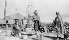 Sarcee Women at Water Pump, Turner Valley, Alberta, ca. 1914. Source: Glenbow Archives, NA-5365-3
