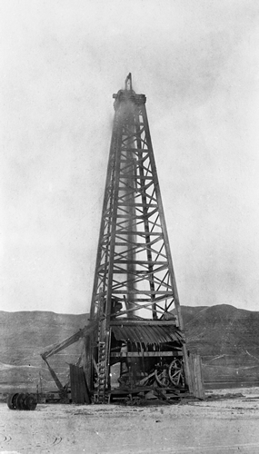 Gas well blowing at Bow Island, Alberta<br/> Source: Glenbow Archives, NA-4048-4