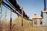 Overhead steam lines at power house, Alberta Government Oil Sands Project site, 2005<br/>Source: Historic Resources Management, 05-D0002-55-7 overhead pipes at powerhouse