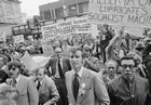 A crowd protesting the federal government’s energy policies gathers outside Calgary’s Palliser Hotel where Prime Minster Pierre Trudeau is attending an event.