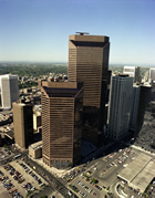 Despite the antipathy in western Canada for the federal Crown corporation, Petro-Canada’s headquarters, seen in this June 1984 aerial view, were established in Calgary. The  reddish brown appearance of the two buildings that make up the Petro-Canada Centre (now known as the Suncor Energy Centre) , coupled with the state-ownership of the company, led many Calgarians to refer to the building as "Red Square."