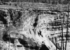 A small thrust fault on the Sheep River west of Turner Valley; taken in 1941, the photograph shows the Lower Alberta and Upper Blairmore geological formations thrusting onto the Lower Alberta formation. <br />Source: Glenbow Archives, NA-4450-10