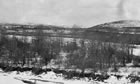 A winter view of Turner Valley, Alberta, ca. 1914-1917, in the period when Canadian Petroleum Products drilled the Dingman No. 1 and No. 2 wells; the plant site is located towards the southern end of this broad valley in Alberta’s foothills. <br />Source: Glenbow Archives, NA-5262-72