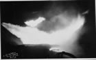 Natural gas being flared at Turner Valley, ca. 1930s; although new markets for natural gas had been found, flaring of waste gas continued. The practise prompted the Government of Alberta to establish the Petroleum and Natural Gas Conservation Board (now Alberta Energy Regulators) in 1938. <br />Source: Glenbow Archives, NA-5290-7
