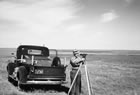 An employee with Standard Oil of British Columbia, a Canadian branch of American Standard Oil (now Chevron) conducts surveys in southern Alberta, 1940. Oil companies conducted their own surveys in the search for oil and gas. <br />Source: Glenbow Archives, NA-5379-1