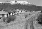 Homes stand abandoned after the town of Nordegg dissolved due to the vacuum created by its fallen coal industry, 1964.