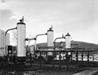 During the Second World War, the Turner Valley Gas Plant played an integral role in the government’s war machine. So vital was this role that sabotage became a real concern. The place was encased within barbed fencing, patrolled by armed guards and lit by search lights at night. Source: Provincial Archives of Alberta, Pollard Collection, P2384
