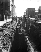 Northwestern Utilities Pipeline at MacDougall Avenue, Edmonton, Alberta, 1923; although originally granted to Northern Alberta Natural Gas Development Company, the contract to deliver gas to Edmonton was finally enacted by Northwestern Utilities, who installed the 126-km (78-mi.) pipeline from the Viking field. Source: Glenbow Archives, ND-3-2062