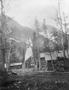 A rough shantytown known as Oil City grew adjacent to the Rocky Development Company’s oil wells.