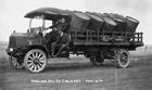 Large trucks loaded with standard-sized oil barrels was another method of getting oil to markets. This truck is transporting oil from Turner Valley to Calgary, 1920s.