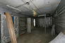 The interior of the electrical work shop after the plant was decommissioned, ca. 2010 <br/>Source: Alberta Culture and Tourism