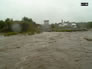 The Sheep River in flood in 2005, prior to the construction of a protective berm. <br />Source: Alberta Culture and Tourism, 2005