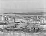 The gasoline plant (centre) was built in 1933. An addition in 1942 (right) enlarged it to almost twice its original size. This photograph is from before 1952, when the propane plant was added to the far side of the original building. <br />Source: Provincial Archives of Alberta, P2513