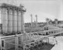 The Turner Valley gas plant in March 1953 showing the absorption plant (left), gasoline plant (right), and part of the propane plant (centre) <br/>Source: Provincial Archives of Alberta, P2904