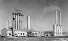 Scrubbers and actifiers of the Madison Natural Gas plant at the Turner Valley plant site, 1945; wartime production resulted in substantial growth for the Turner Valley plant. <br />Source: Glenbow Archives, IP-6d-4-7b