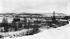 Distant view of the Dingman No. 1 well (Calgary Petroleum Products) and gas plant operation, Turner Valley, Alberta, ca. 1914-1917; the earliest version of the Turner Valley plant was very rudimentary in its appearance and technology. <br />Source: Glenbow Archives, NA-5262-16