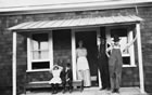 Mary Brown and her family, Turner Valley area, 1914; Mary was among the pioneers who arrived in the region after the 1914 oil strike. Her husband, Joseph, worked on the Dingman No. 1 and No. 2 wells. Source: Glenbow Archives, NA-5535-9