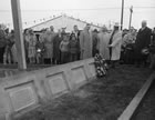 Sam Coultis, at right holding hat, was in attendance at the unveiling of a cairn at Turner Valley, 1956. <br />Source: Glenbow Archives, NA-5600-6885d