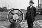 The original compressor from the Calgary Petroleum Products plant at Dingman No. 1, photographed ca. 1935; the man is possibly A. W. Dingman. The plaque reads: "The first Compressor in Canada to be used for the extraction of Gasoline from Natural Gas. Installed in 1914 by Mr. A. W. Dingman." <br />Source: Glenbow Archives, PA-3670-27