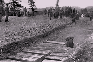 The mass burial of Hillcrest explosion victims