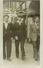 Joe Sikora (in centre) walking in Calgary, n.d.