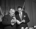 Presentation of book ends made from Alberta natural gas well drill cores to C.D. Howe, December 1955. Source: Glenbow Archives, NA-5600-8274