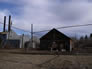 Overhead steam line by warehouse and power house, 2001<br/>Source: Historic Resources Management, 01-D0001-53-1a lines at Warehouse