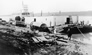 Unloading a barge at the International Bitumen Company plant, ca. 1936<br/>Source: University of Alberta Archives, 83-160-12