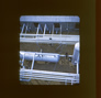 View from the top of the fractionating tower with pressure settling tank at centre and one of the flash towers just visible at right, Alberta Government Oil Sands Project, late 1940s<br/>Source: University of Alberta Archives, 83-160-8