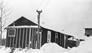 At some point in its history, Fitzsimmons’s house also served as the cook house for the International Bitumen Company site, n.d.; the circular saw blade served as a dinner gong.<br/>Source: University of Alberta Archives, 83-160-80