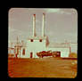 Driving a loaded truck onto the weigh scale, Alberta Government Oil Sands Project,1949<br/>Source: University of Alberta Archives, 91-137-031