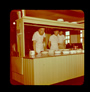 Ready to serve a meal in the cook house, Alberta Government Oil Sands Project, 1949<br/>Source: University of Alberta Archives, 91-137-045