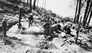 Processing the oil sands, ca. 1929, before the first plant was constructed; men worked in close quarters with the hot oil sands as they moved it through the separation process.<br/>Source: Provincial Archives of Alberta, A3383