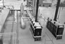 Refinery area of the Alberta Government Oil Sands Project plant, ca. 1950; the black structures in the right foreground are heaters that warmed the oil to the high temperatures required for upgrading.<br/>Source: Provincial Archives of Alberta, A3559