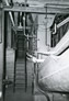 Interior view showing conveying mechanism, Alberta Government Oil Sands Project, ca. 1950; the oil sands were broken up and hot water was added in this part of the process. Next, the sand went to the rotary screen.<br/>Source: Provincial Archives of Alberta, PR1968.0015.27-98
