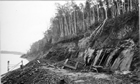 In 1927 Karl Clark photographed an oil sands quarry operated by Sidney Ells on the Clearwater River, at a location a bit downstream of the site chosen for the 1929 test plant. Source:	University of Alberta Archives, 75-82-1-14